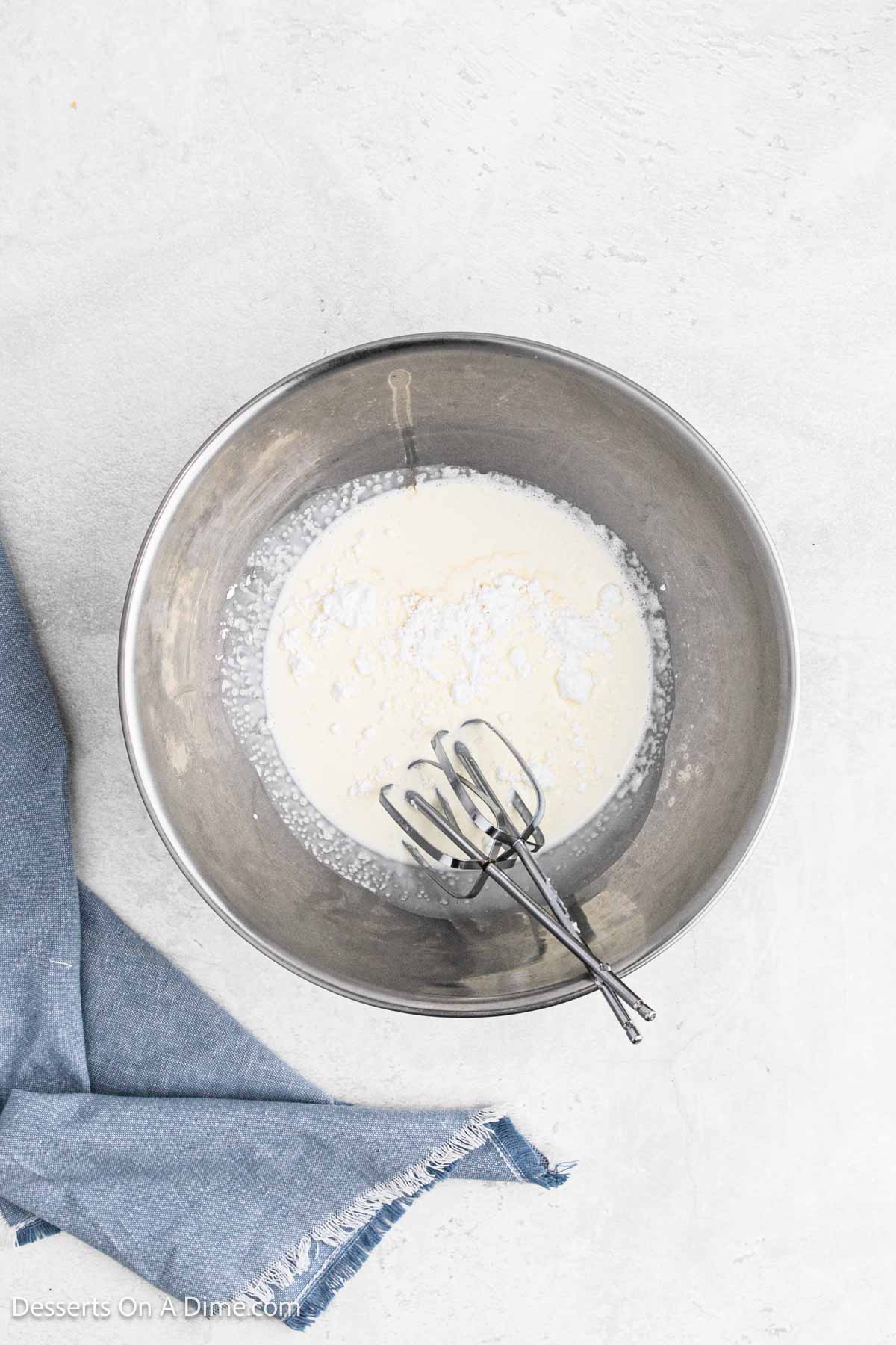 Heavy cream beat until soft peaks in mixing bowl.