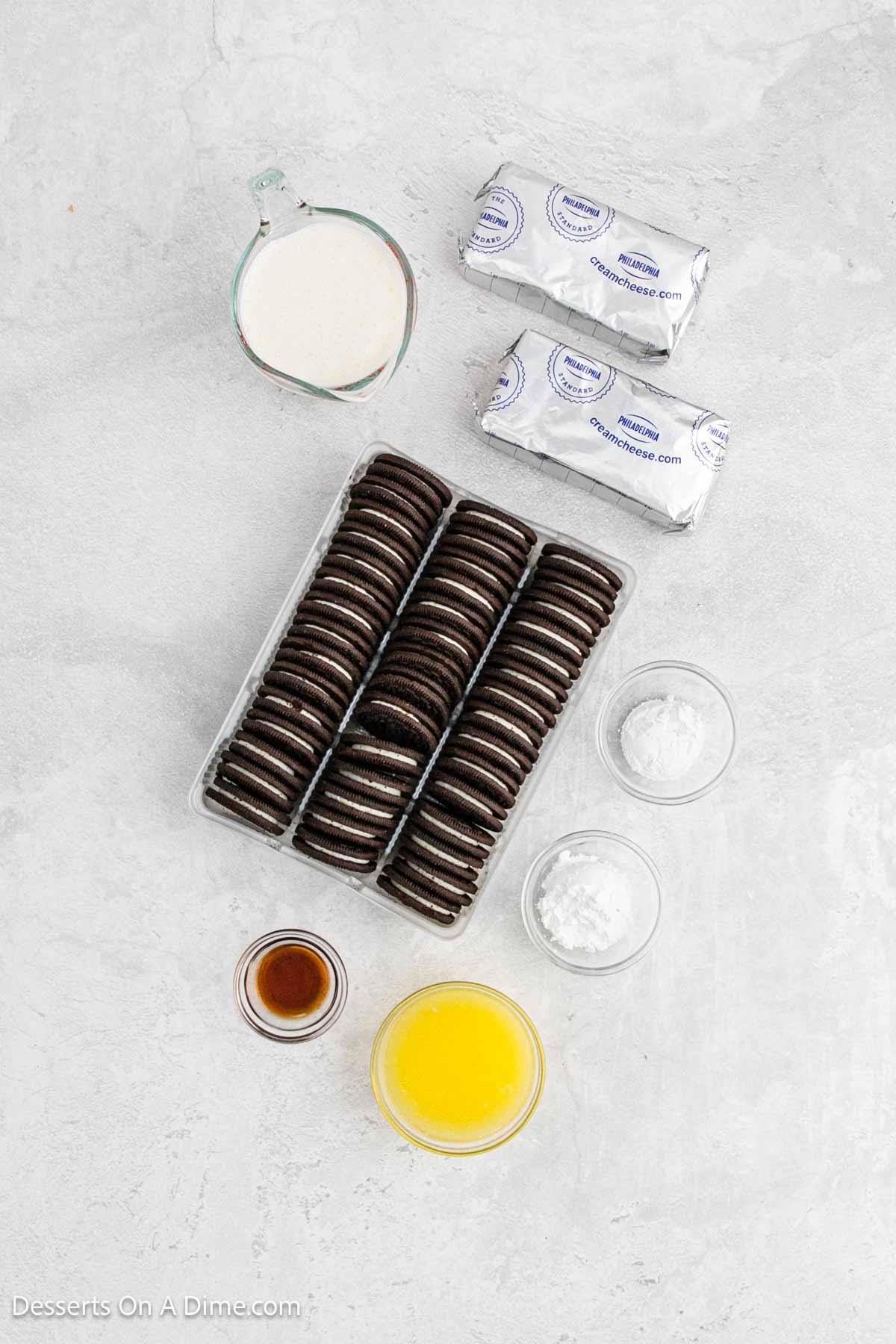 Ingredients for recipe: Oreo cookies, unsalted butter, cream cheese, powdered sugar and heavy cream.