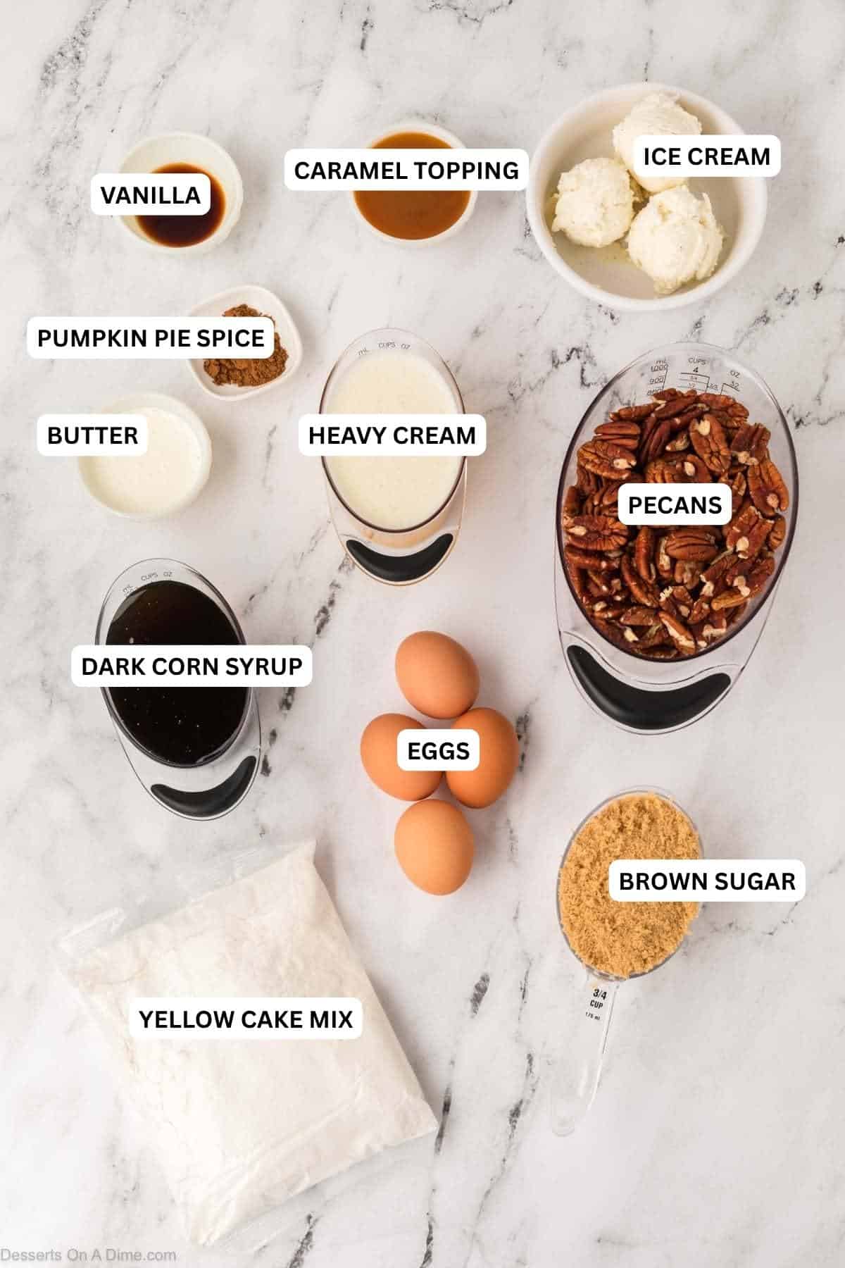 Ingredients for recipe: yellow cake mix, brown sugar, eggs, corn syrup, pecans, heavy cream, butter, pumpkin pie spice, ice cream, Caramel and vanilla. 
