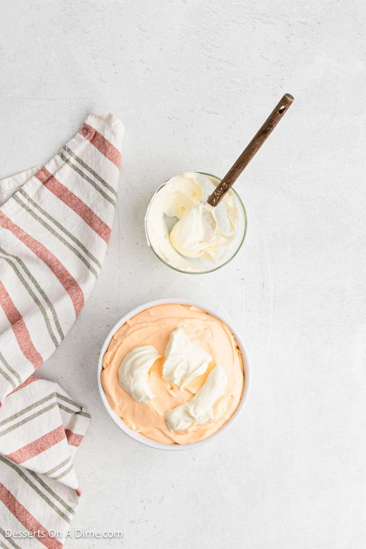 Reserved white mixture dolloped on top and swirled together.