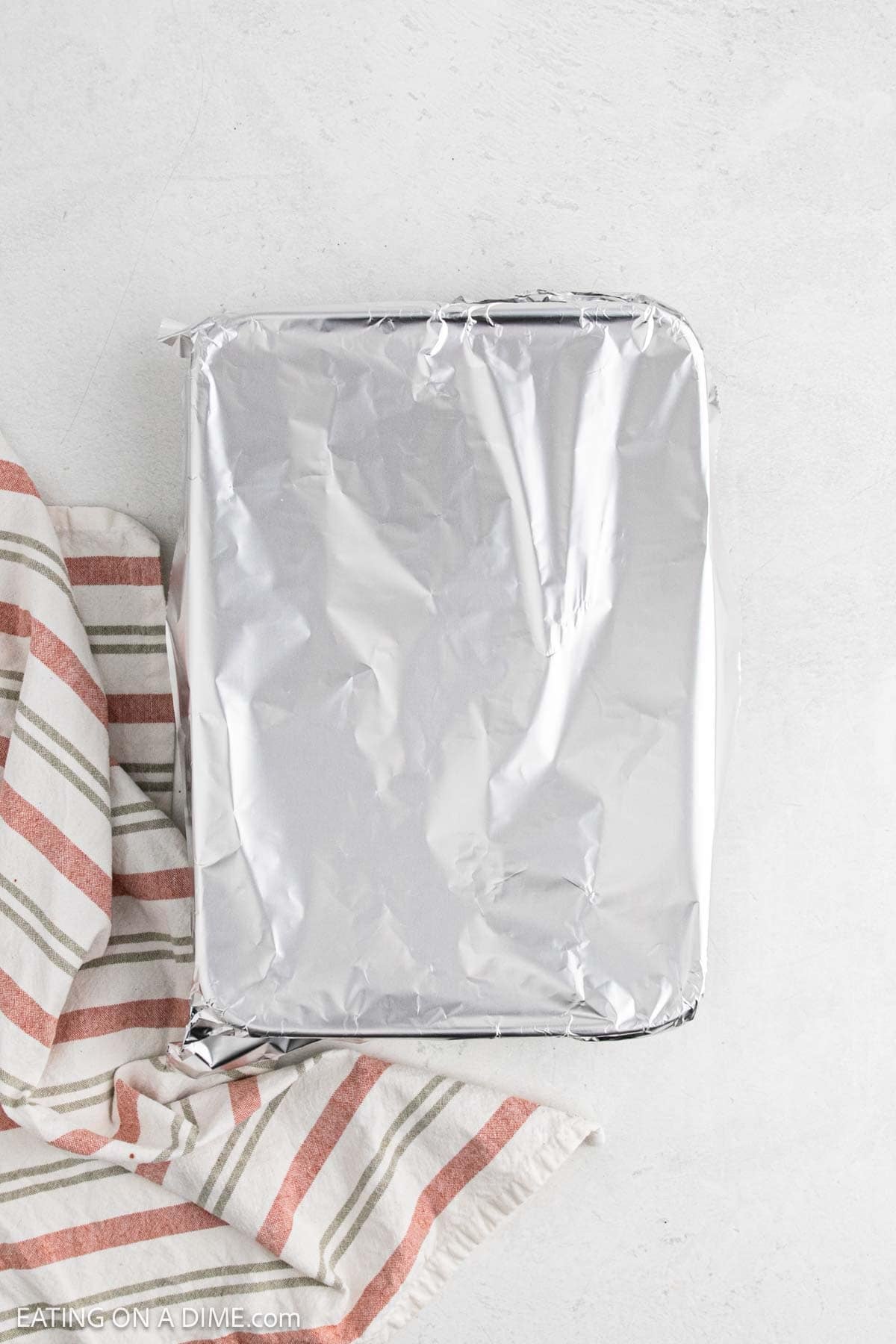Foil on top of baking dish. 